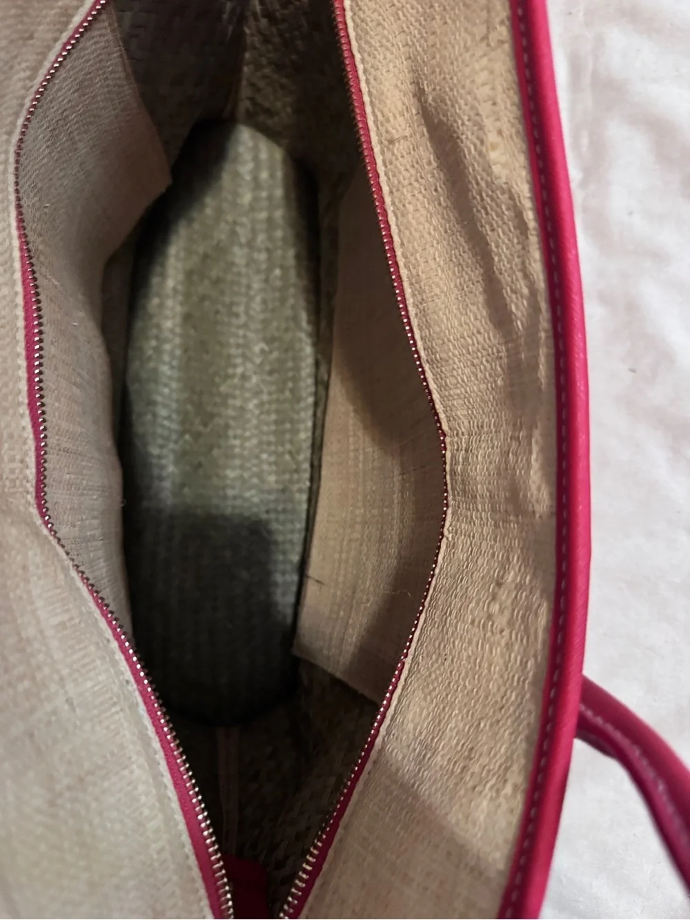 Tory Burch straw tote features vibrant red leather stripes